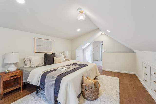 527 N Columbia Ave, Bexley, OH 43209 - bedroom featuring lofted ceiling, wood finished floors, and recessed lighting