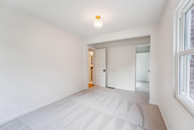 527 N Columbia Ave, Bexley, OH 43209 - carpeted empty room with baseboards