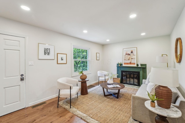 527 N Columbia Ave, Bexley, OH 43209 - living room with light wood-style flooring, a fireplace, and recessed lighting