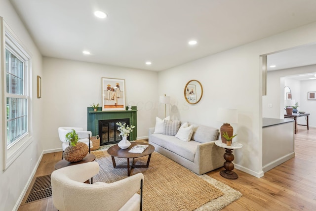 527 N Columbia Ave, Bexley, OH 43209 - living room with light wood finished floors, a fireplace, plenty of natural light, and recessed lighting