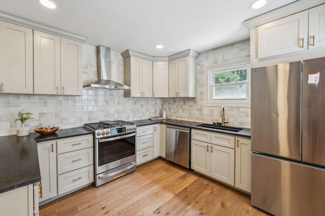 527 N Columbia Ave, Bexley, OH 43209 - kitchen featuring stainless steel appliances, wall chimney exhaust hood, dark countertops, tasteful backsplash, and recessed lighting