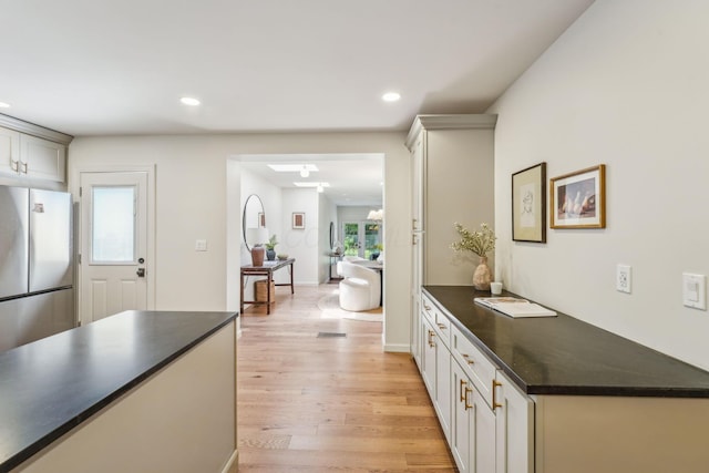 527 N Columbia Ave, Bexley, OH 43209 - kitchen featuring freestanding refrigerator, dark countertops, light wood finished floors, and recessed lighting