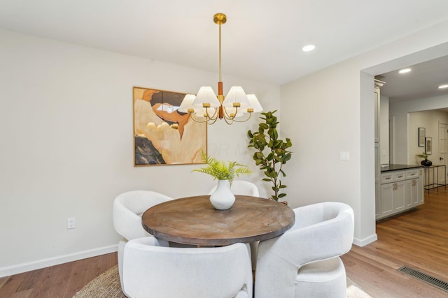 527 N Columbia Ave, Bexley, OH 43209 - dining area featuring wood finished floors, a chandelier, and recessed lighting