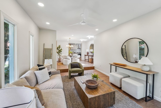 527 N Columbia Ave, Bexley, OH 43209 - living room featuring wood finished floors, plenty of natural light, arched walkways, recessed lighting, and a ceiling fan