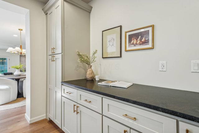 527 N Columbia Ave, Bexley, OH 43209 - detailed view of wood finished floors and a chandelier