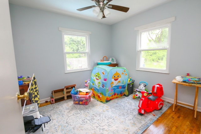 1810 Lehner Rd, Columbus, OH 43224 - game room with plenty of natural light, wood finished floors, and ceiling fan
