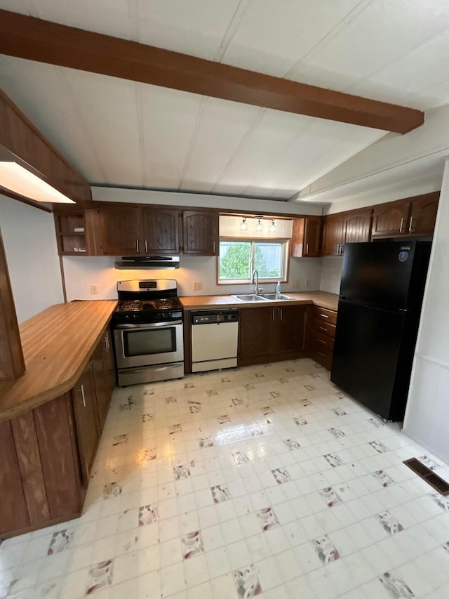 110 E Hickory Grove Rd Unit 45, Urbana, OH 43078 - kitchen featuring stainless steel gas range, white dishwasher, under cabinet range hood, freestanding refrigerator, and light flooring