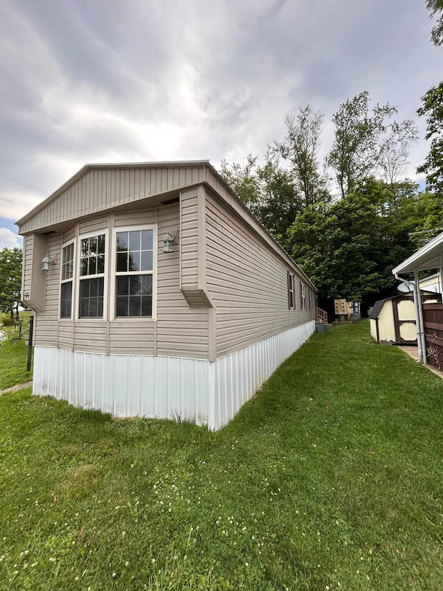 110 E Hickory Grove Rd Unit 45, Urbana, OH 43078 - view of side of property featuring a lawn
