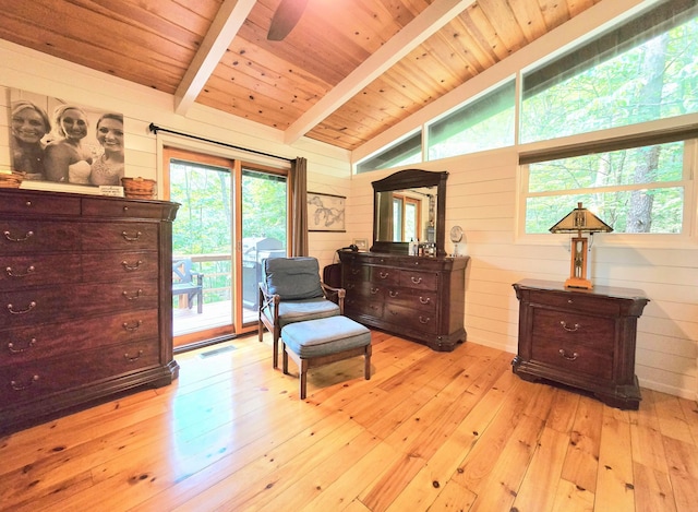 82 Lodge Ln, Hide A Way Hills, OH 43107 - sitting room featuring light wood-style floors, wooden walls, and wood ceiling