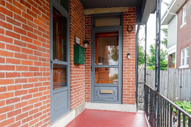 1366 S 4th St, Columbus, OH 43207 - property entrance featuring brick siding and a porch