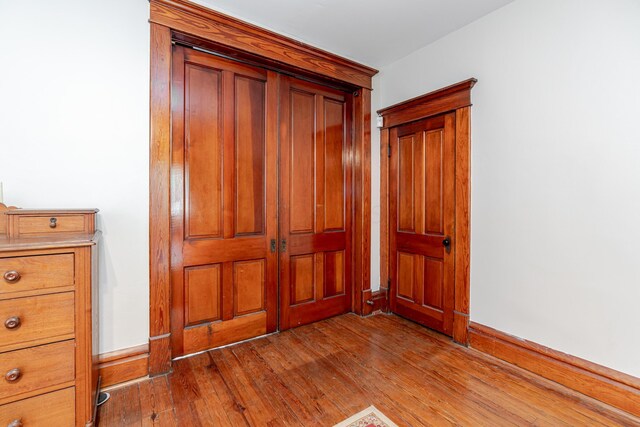 1366 S 4th St, Columbus, OH 43207 - unfurnished bedroom featuring hardwood / wood-style floors
