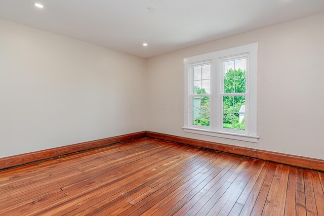 1366 S 4th St, Columbus, OH 43207 - unfurnished room with wood-type flooring and recessed lighting
