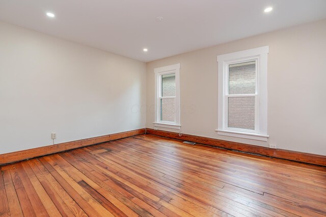 1366 S 4th St, Columbus, OH 43207 - spare room featuring light wood-style flooring and recessed lighting