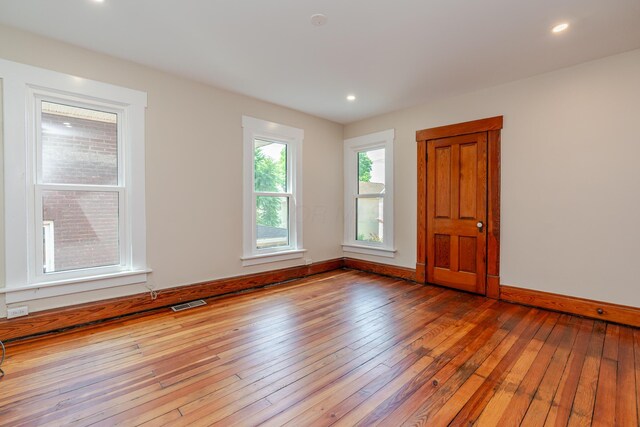 1366 S 4th St, Columbus, OH 43207 - empty room with hardwood / wood-style floors and recessed lighting