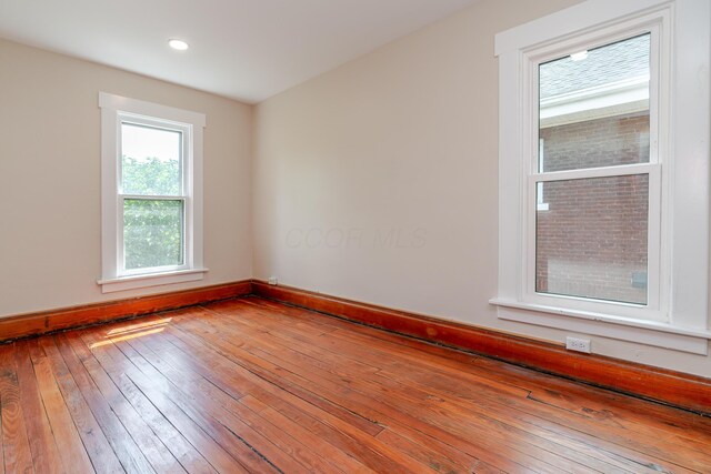 1366 S 4th St, Columbus, OH 43207 - empty room with wood-type flooring and recessed lighting