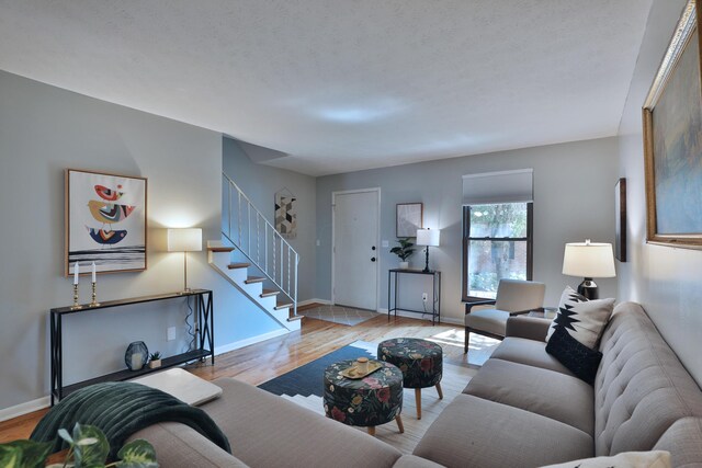 1820 Willoway Cir S, Columbus, OH 43220 - living room with wood finished floors and stairway
