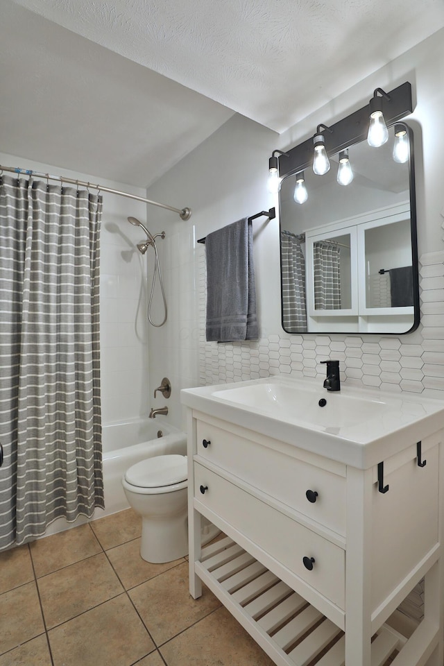 1820 Willoway Cir S, Columbus, OH 43220 - bathroom with vanity, tile patterned flooring, shower / bath combo, and decorative backsplash