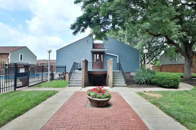 1820 Willoway Cir S, Columbus, OH 43220 - view of front of home featuring stairway, a wooden deck, and a community pool