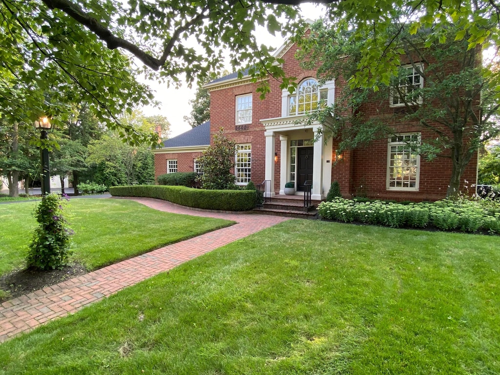 4249 Vaux Link, New Albany, OH 43054 - colonial home with brick siding and a front yard
