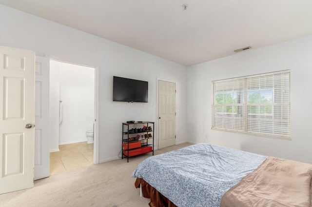 6065 Craughwell Ln, Dublin, OH 43017 - tiled bedroom featuring carpet floors and ensuite bath
