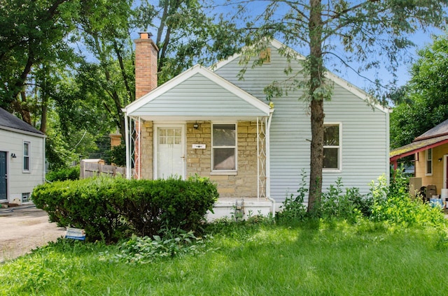 178 S Weyant Ave, Columbus, OH 43213 - bungalow-style home featuring a chimney and stone siding