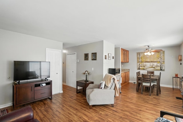 3063 Jersey Dr Unit 67, Columbus, OH 43204 - living room with wood finished floors and ceiling fan