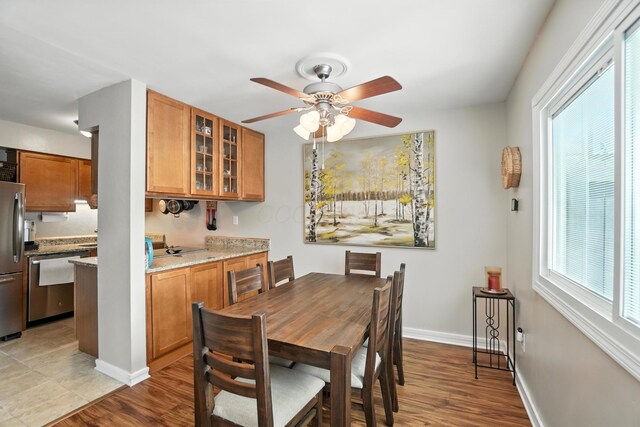3063 Jersey Dr Unit 67, Columbus, OH 43204 - dining area featuring a ceiling fan and light wood-type flooring