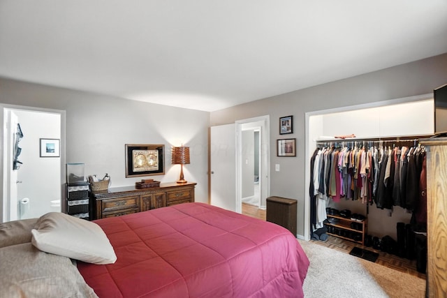 3063 Jersey Dr Unit 67, Columbus, OH 43204 - bedroom featuring a walk in closet and ensuite bathroom