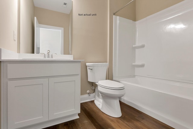 7641 Clifton Loop, Pickerington, OH 43147 - bathroom with wood finished floors, vanity, and bathtub / shower combination