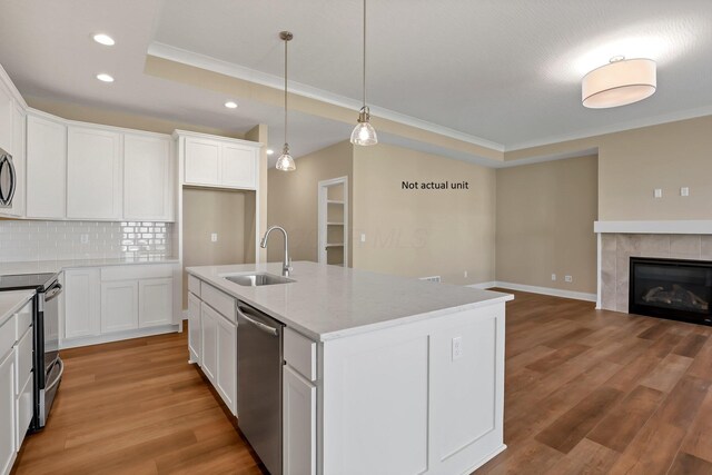 7641 Clifton Loop, Pickerington, OH 43147 - kitchen featuring stainless steel appliances, crown molding, tasteful backsplash, recessed lighting, and light wood-type flooring