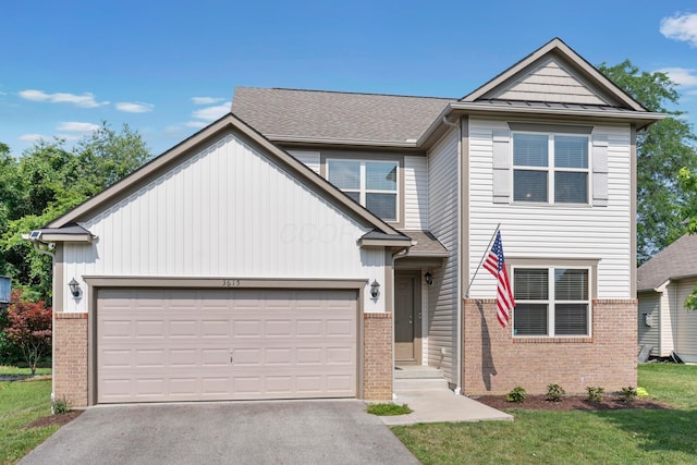 3615 Motts Place Ct, Canal Winchester, OH 43110 - view of front facade featuring brick siding, a garage, driveway, and a front yard