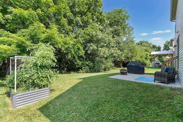 3615 Motts Place Ct, Canal Winchester, OH 43110 - view of grassy yard featuring a patio and a garden
