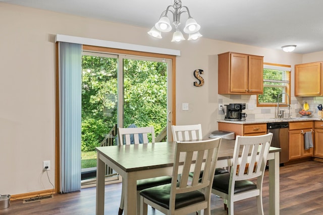 3615 Motts Place Ct, Canal Winchester, OH 43110 - dining area featuring a chandelier and dark wood-style floors