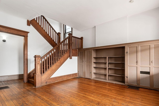 356 E 20th Ave, Columbus, OH 43201 - stairway featuring hardwood / wood-style floors