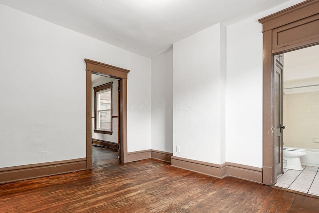 356 E 20th Ave, Columbus, OH 43201 - spare room featuring wood-type flooring and baseboards