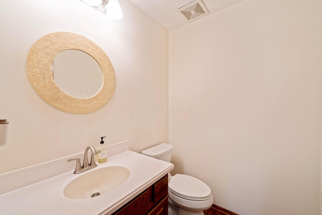 175 Academy Woods Dr, Columbus, OH 43230 - half bathroom featuring vanity and toilet