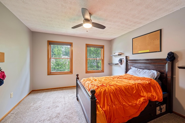 175 Academy Woods Dr, Columbus, OH 43230 - carpeted bedroom with a textured ceiling and ceiling fan