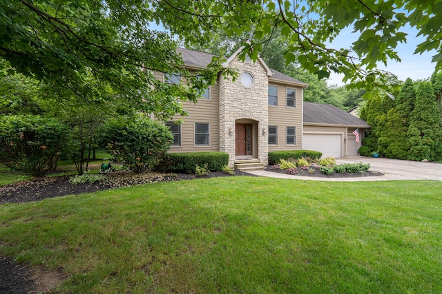 175 Academy Woods Dr, Columbus, OH 43230 - traditional-style home featuring an attached garage, concrete driveway, a front yard, and stone siding