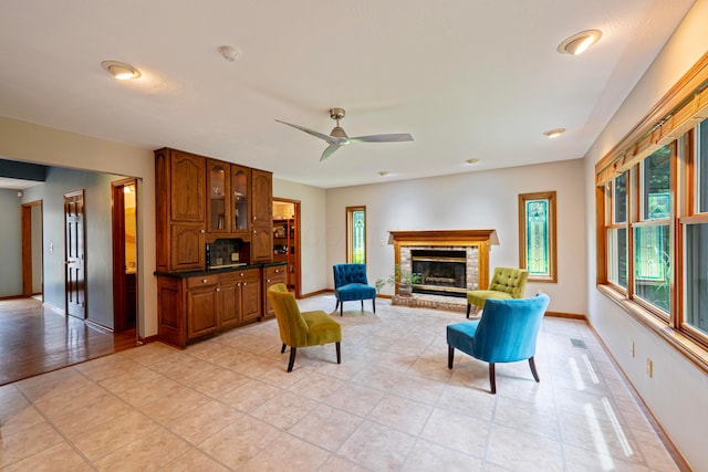 175 Academy Woods Dr, Columbus, OH 43230 - living area with a fireplace, light tile patterned flooring, and ceiling fan