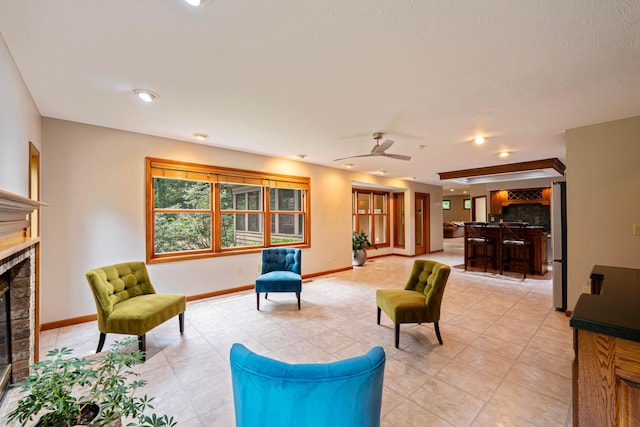 175 Academy Woods Dr, Columbus, OH 43230 - living room featuring a fireplace, light tile patterned floors, ceiling fan, and recessed lighting