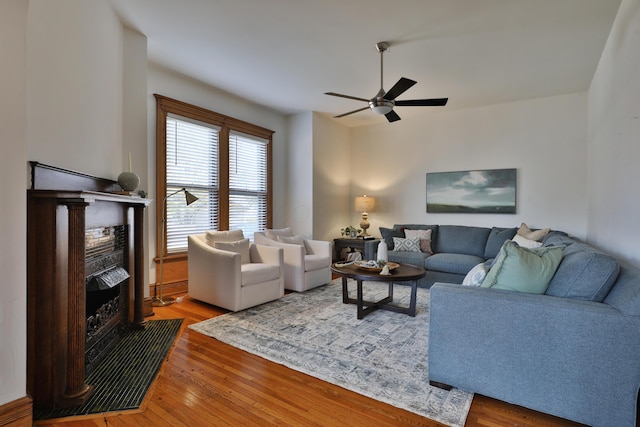 398 W 5th Ave, Columbus, OH 43201 - living room featuring ceiling fan, hardwood / wood-style flooring, and a fireplace with raised hearth