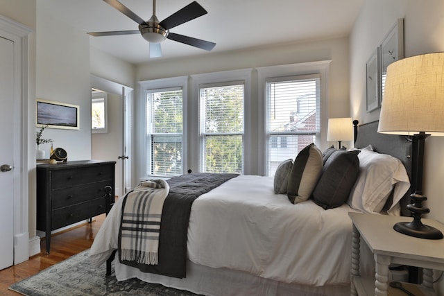 398 W 5th Ave, Columbus, OH 43201 - bedroom with wood finished floors and a ceiling fan