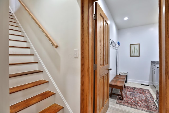398 W 5th Ave, Columbus, OH 43201 - staircase with recessed lighting and baseboards