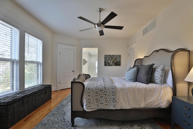398 W 5th Ave, Columbus, OH 43201 - bedroom with light wood-type flooring and ceiling fan
