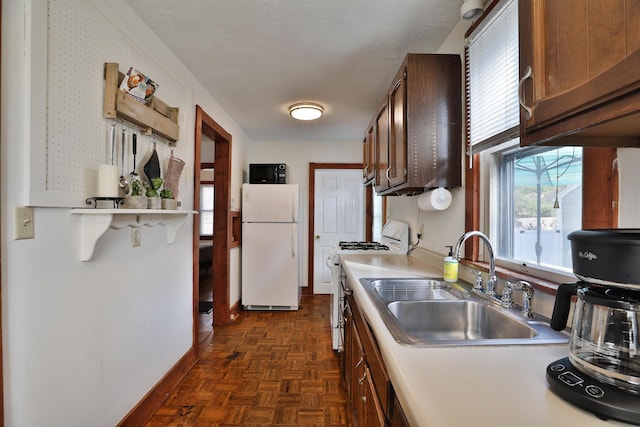 398 W 5th Ave, Columbus, OH 43201 - kitchen with white appliances and light countertops