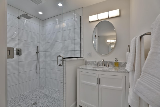 398 W 5th Ave, Columbus, OH 43201 - bathroom featuring a shower stall, vanity, and recessed lighting