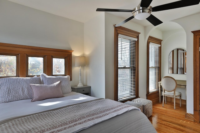 398 W 5th Ave, Columbus, OH 43201 - bedroom with light wood finished floors and ceiling fan