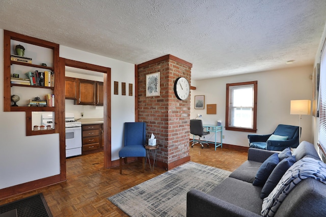 398 W 5th Ave, Columbus, OH 43201 - living area featuring an office area and a textured ceiling