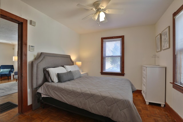 398 W 5th Ave, Columbus, OH 43201 - bedroom featuring baseboards and ceiling fan