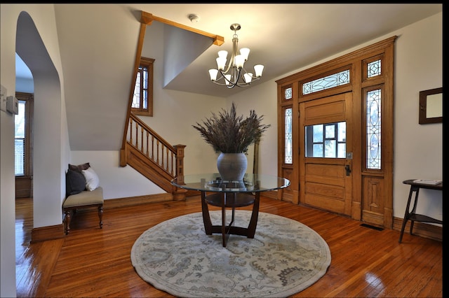 398 W 5th Ave, Columbus, OH 43201 - entrance foyer featuring a chandelier, wood-type flooring, and stairs